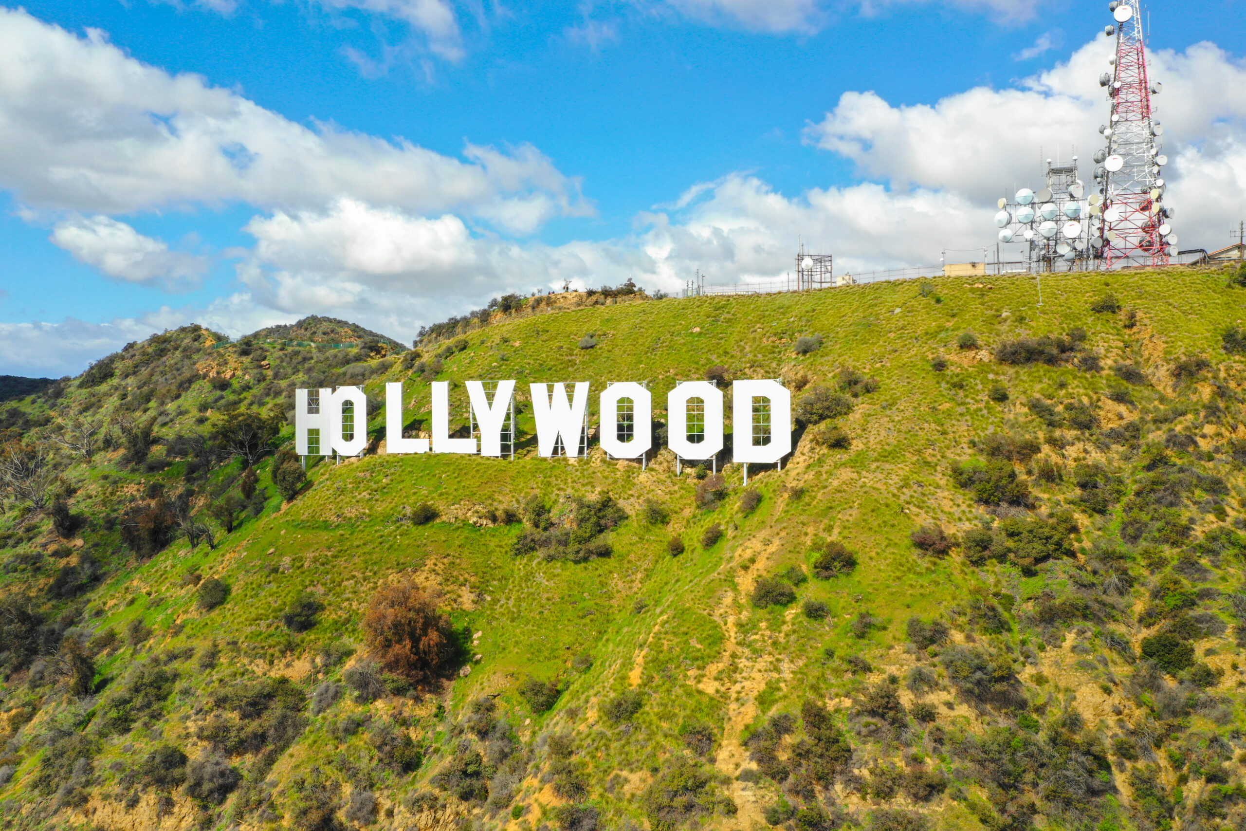 Hollywood sign board with mobile towers
