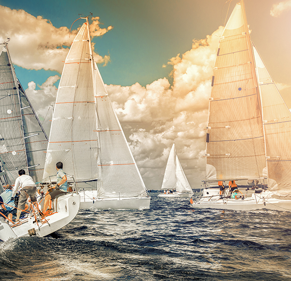 Group of people riding yacht in an ocean