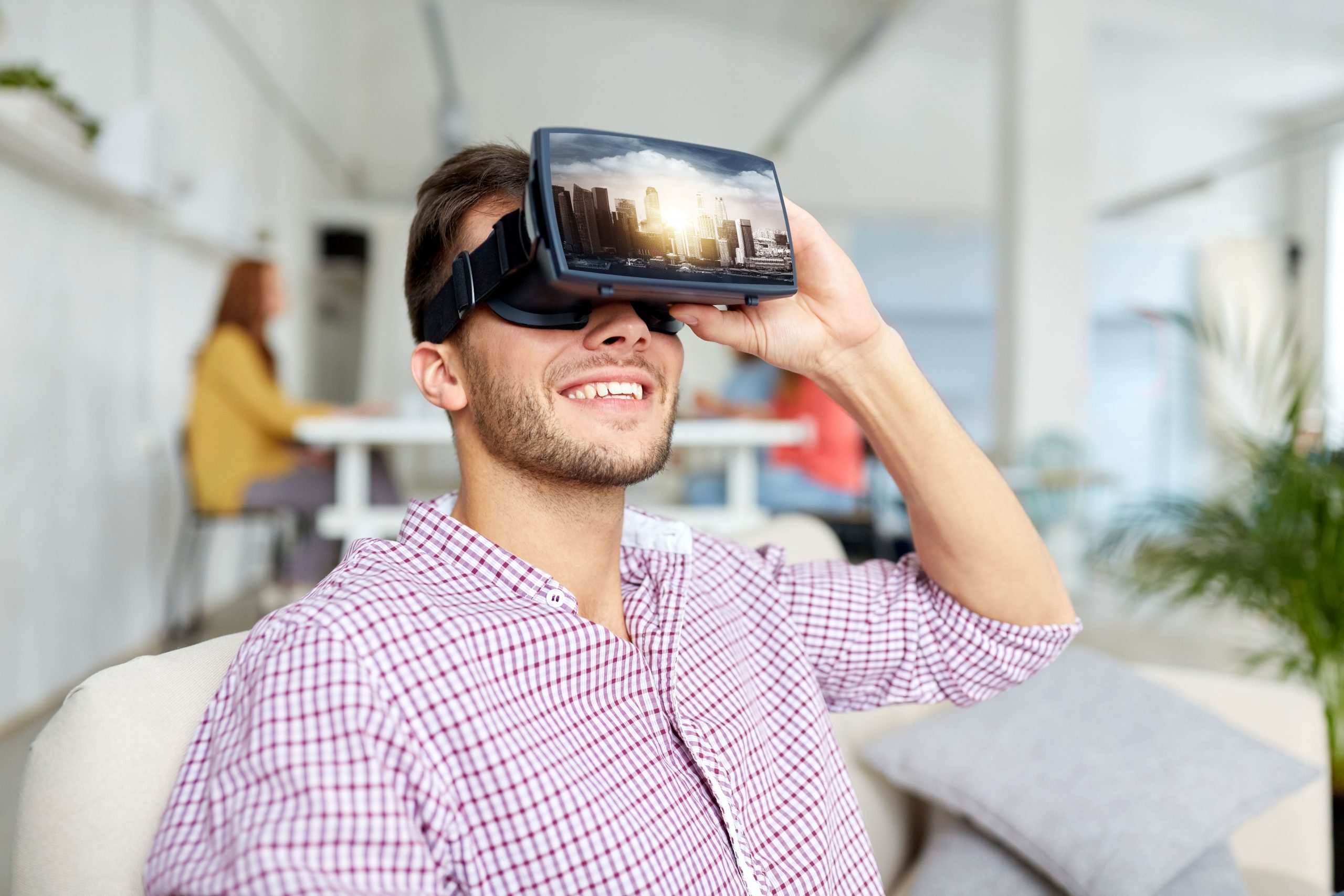 Person smiling and wearing the virtual glasses