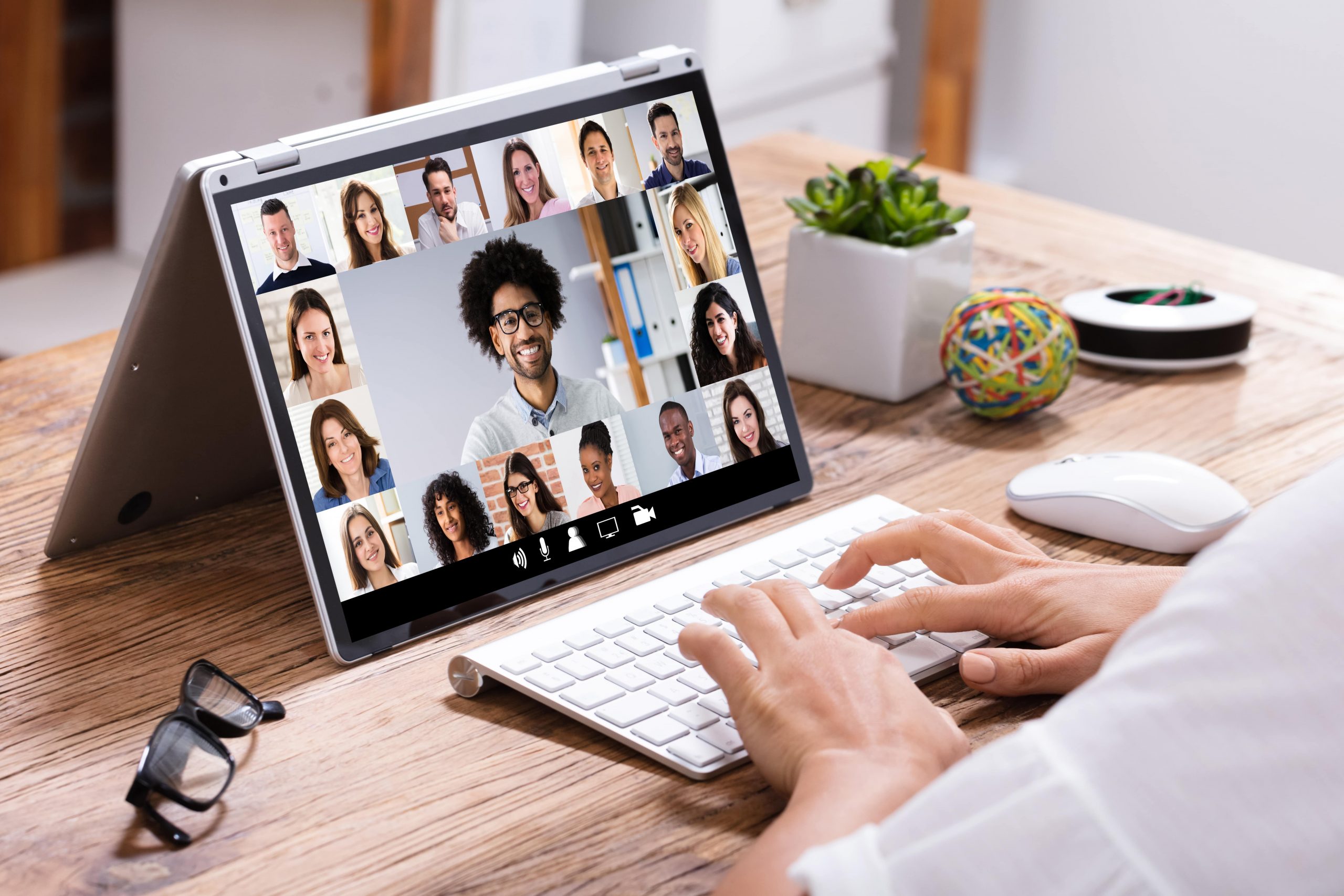 Group of people attending virtual meeting